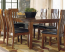 D594-01/35 Ashley Ralene Rectangular Butterfly Table with 6 Upholstered Chairs IMAGE 1